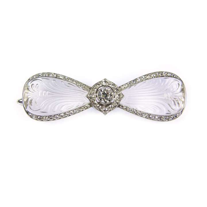 Early 20th century carved rock crystal and diamond bow brooch